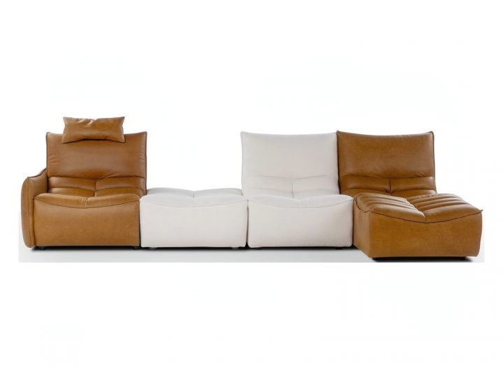 Zip Relaxsofa | Calia Italia. Modular sofa with recliner for ultimate comfort, quilted craftsmanship, adaptable design, and manual headrest adjustment for optimized relaxation.