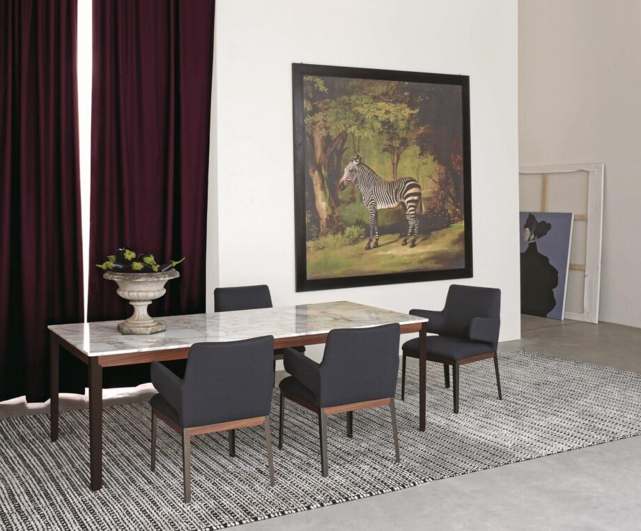 Hug table | Arflex. Elegant table with a marble top and sleek frame, designed by Claesson Koivisto Rune, perfect for sophisticated and contemporary interior spaces.