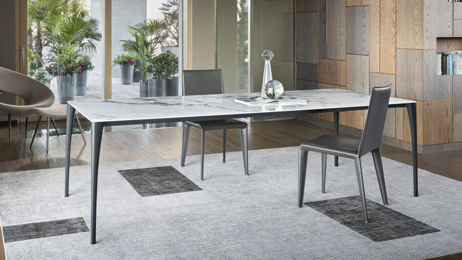 Sol table | Bonaldo. Innovative Sol table with elegant, minimalist design; features slender aluminium legs and versatile style for various room decor; ideal for both work and social settings.