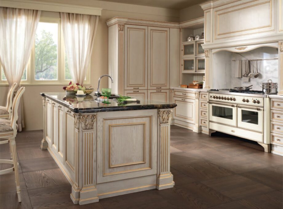 Roma kitchen | FM bottega d'Arte. The Roma kitchen exudes luxury and elegance with exquisite craftsmanship and ample storage. A versatile blend of traditional and modern design.