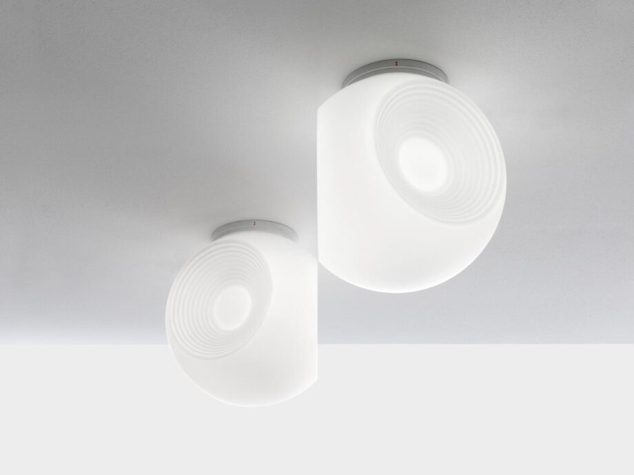 Eyes ceiling lamp | Fabbian. Eyes lamp: Simple sphere design, offers dual light intensities, spreads bright light effectively, suits various indoor environments.