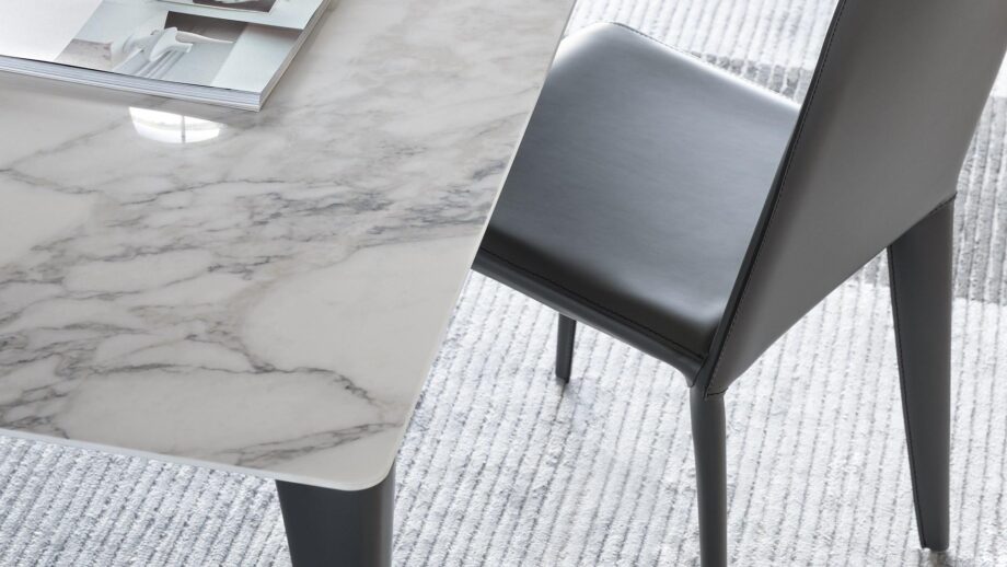 Sol table | Bonaldo. Innovative Sol table with elegant, minimalist design; features slender aluminium legs and versatile style for various room decor; ideal for both work and social settings.
