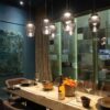 Aella Thin S pendant lamp | Leucos. Handblown glass pendant with LED light, offering dimmer function and combining timeless design with modern technology for illumination.