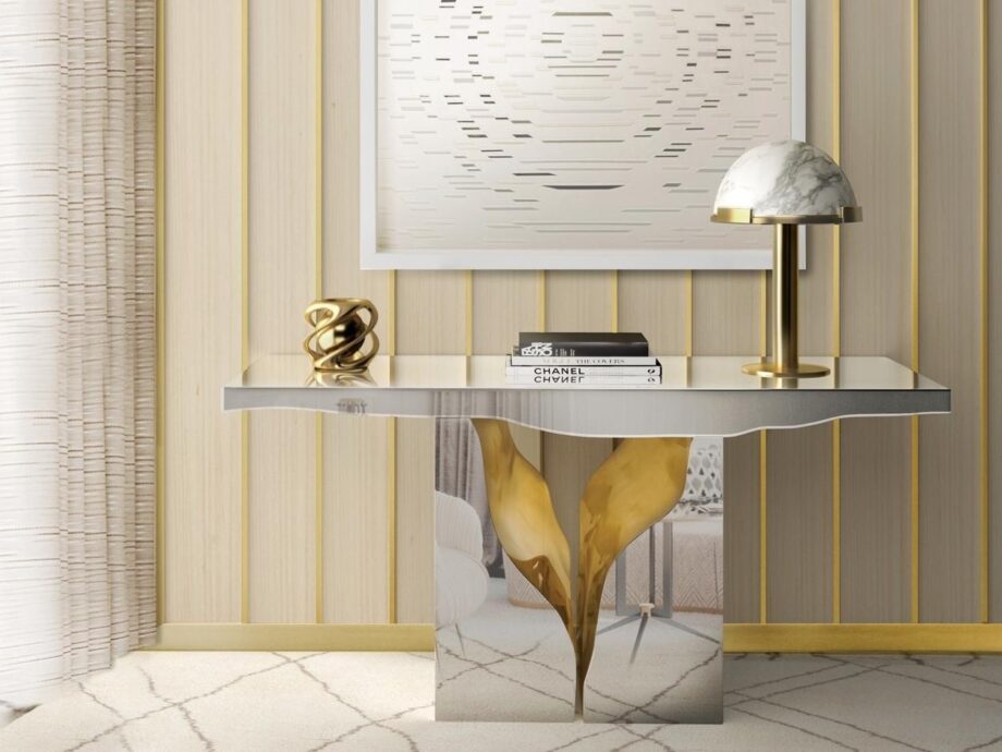 Lapiaz console | Boca Do Lobo. This modern console features an exquisite stone-like crack design with a luxurious polished brass interior, bringing elegance and a unique aesthetic to any space.