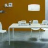 Light table | Tonin Casa. Functional and spacious table with extendable features for large gatherings, offering a sense of modernity and lightness.