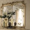 14658 mirror | Modenese Gastone. Elegant figured mirror with intricate frame design, enhances room aesthetics and functionality.