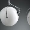 Beluga White pendant lamp | Fabbian. Elegant pendant lamp with adjustable blown glass diffusers and polished chromium-plated structure, offering versatile illumination options.