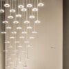 Bella pendant lamp | Panzeri. Stylish pendant lamp with adjustable head, STEP DIM technology, and multiple light settings for versatile illumination options.