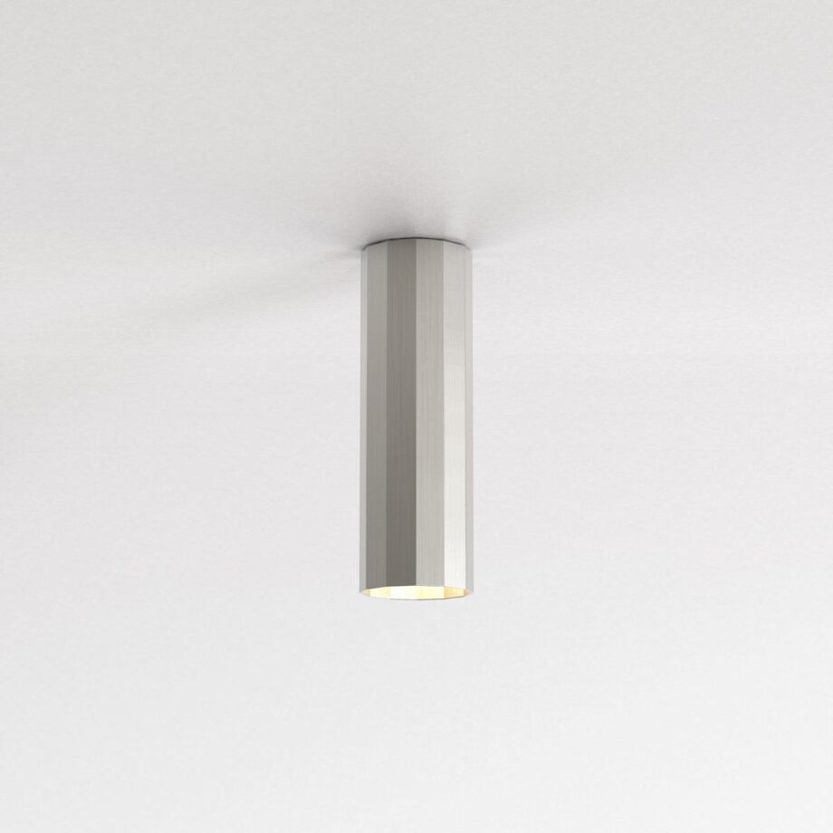 Hashira Surface 250 spotlight | Astro lighting. The Hashira Surface 250 is a sleek aluminum LED ceiling spotlight, offering dimmable lighting, seamless design, and defined shadow play inspired by neoclassical architecture.