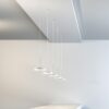 Bella pendant lamp | Panzeri. Stylish pendant lamp with adjustable head, STEP DIM technology, and multiple light settings for versatile illumination options.