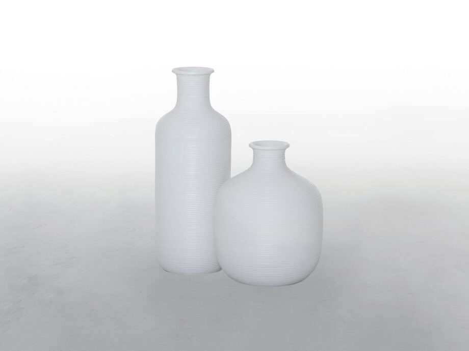 Stripe vase | Tonin Casa. Elegant vases in two sizes, tall and thin or wide and round. Perfect for adding a touch of luxury to any room.