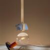 Lampadina table lamp | Flos. Iconic design table lamp, offers direct and diffused light with a clever cable-management base.