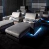 Dustin armchair | Formitalia. Luxurious reclining cinema seat with velvet and leather finish, integrated fridge, LED lights, and USB charging for ultimate comfort.