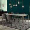Light table | Tonin Casa. Functional and spacious table with extendable features for large gatherings, offering a sense of modernity and lightness.