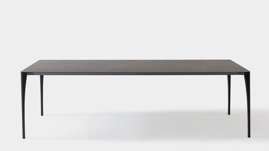 Sol table | Bonaldo. Innovative Sol table with elegant, minimalist design; features slender aluminium legs and versatile style for various room decor; ideal for both work and social settings.