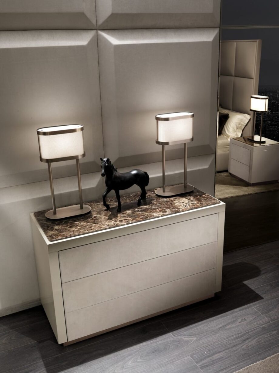 Envy chest of drawers | DV home. Elegant chest of drawers with luxurious finishes: mirror, lacquer, leather, and marble top, on a stylish steel base.