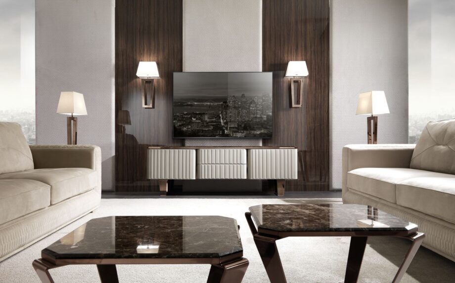 Ritz wall lamp | DV home. A luxurious Art Deco wall lamp featuring a geometric metal frame and elegant fabric shade, perfect for sophisticated interiors.