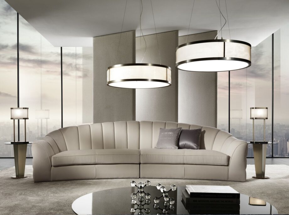 Gordon Round chandelier | DV home. A luxurious round chandelier with a metal structure, a beige fabric shade, and methacrylate diffusers, perfect for sophisticated interiors.