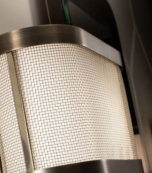 Gordon floor lamp | DV home. Elegant floor lamp with a metal structure and fabric shade, embodying luxurious Art Deco design.