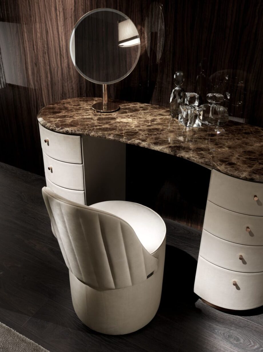 Tiffany dressing table | DV home. Exquisite console-dressing table with luxurious leather upholstery and a marble top, featuring drawers and a mirror.