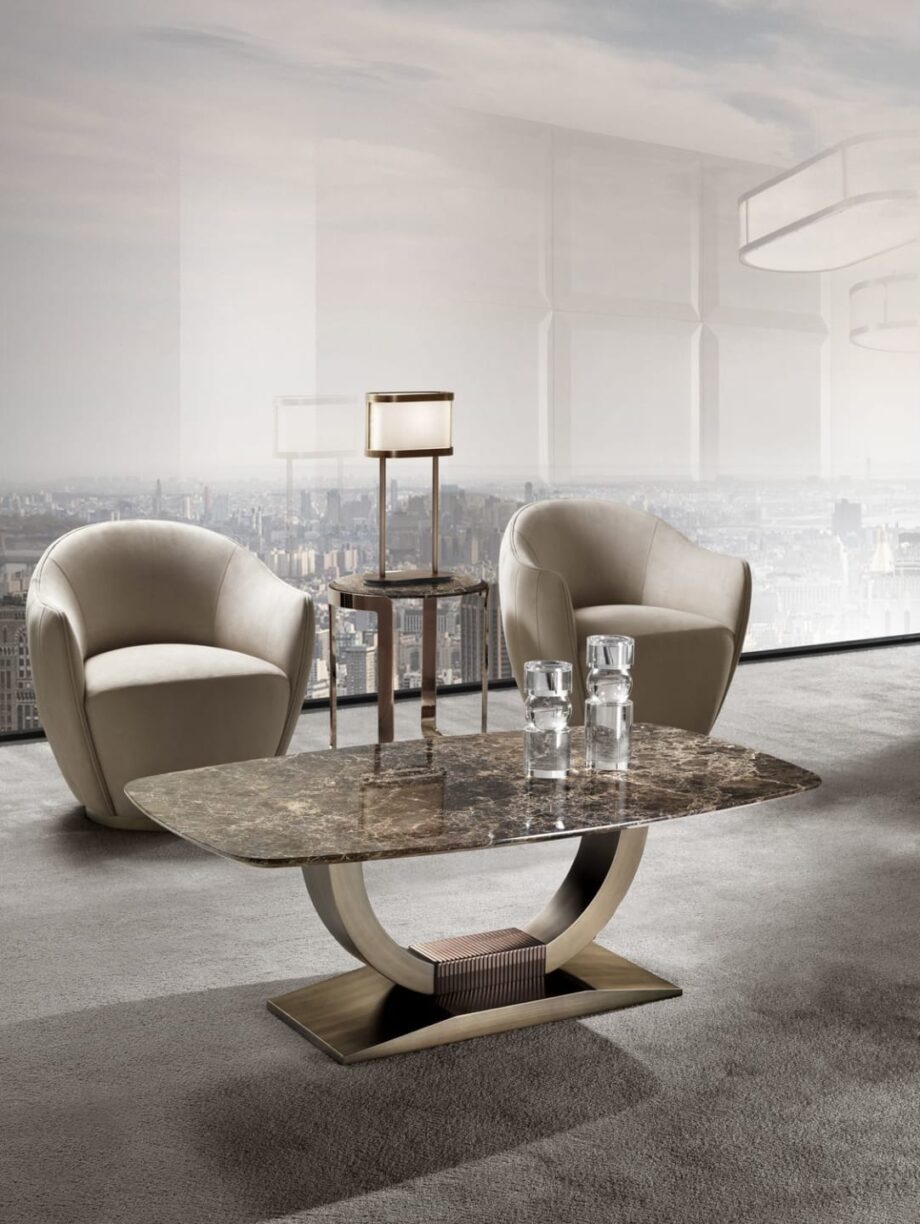 Hermes Suite coffee table | DV home. Exquisite coffee table with an elegant curved base and luxurious finishes, embodying modern Art Deco charm.