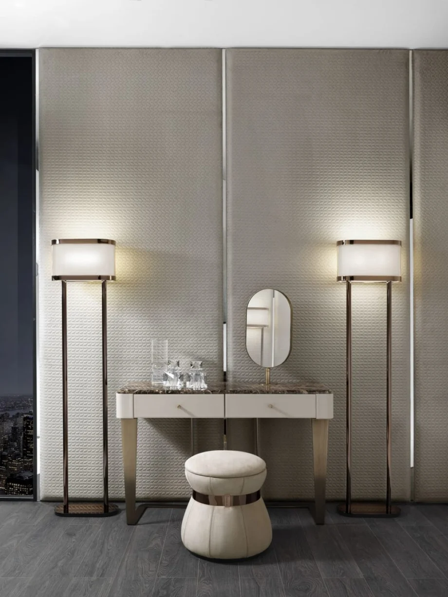 Gordon floor lamp | DV home. Elegant floor lamp with a metal structure and fabric shade, embodying luxurious Art Deco design.