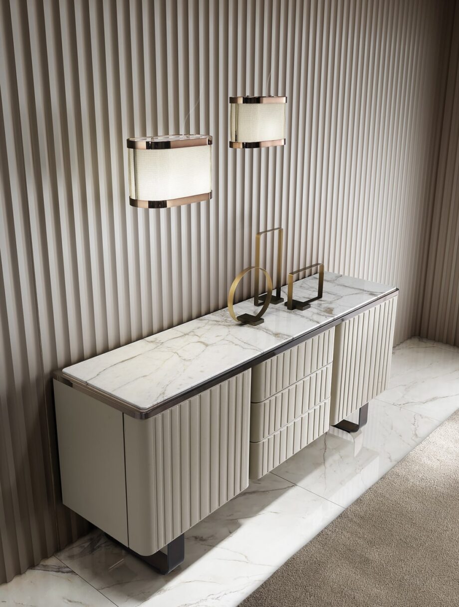 Gordon pendant lamp | DV home. Exquisite Art Deco suspension lamp with luxurious metal finishes and a soft fabric shade, creating an elegant ambiance.