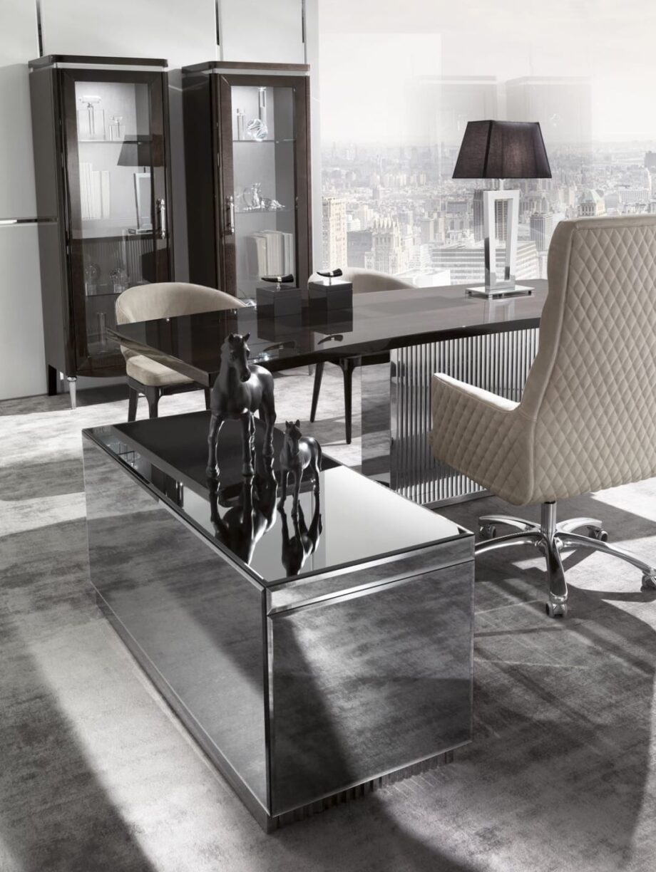 Windsor executive chair | DV home. Luxurious swivel armchair with Art Deco flair, offering supreme comfort and sophisticated design for discerning interiors.