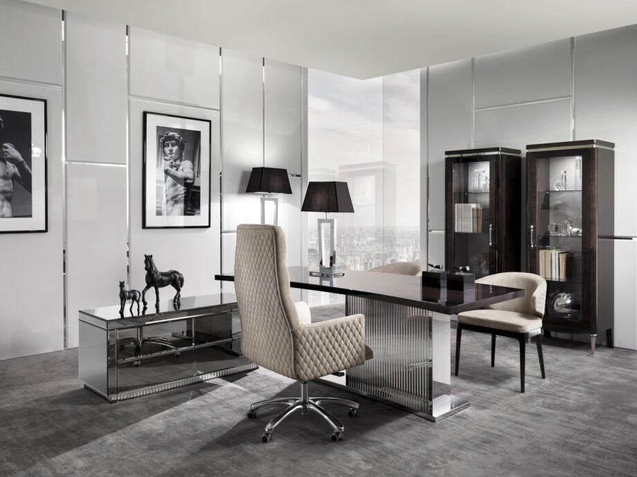 Windsor executive chair | DV home. Luxurious swivel armchair with Art Deco flair, offering supreme comfort and sophisticated design for discerning interiors.