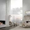 Gordon floor lamp | DV home. Elegant floor lamp with a metal structure and fabric shade, embodying luxurious Art Deco design.