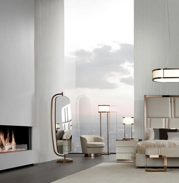 Gordon floor lamp | DV home. Elegant floor lamp with a metal structure and fabric shade, embodying luxurious Art Deco design.
