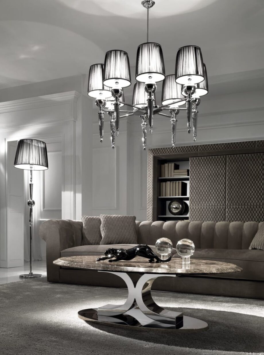 Douglas chandelier | DV home. A luxurious Art Deco chandelier crafted from shining brass or chrome, adorned with elegant fabric shades and dazzling crystal accents.