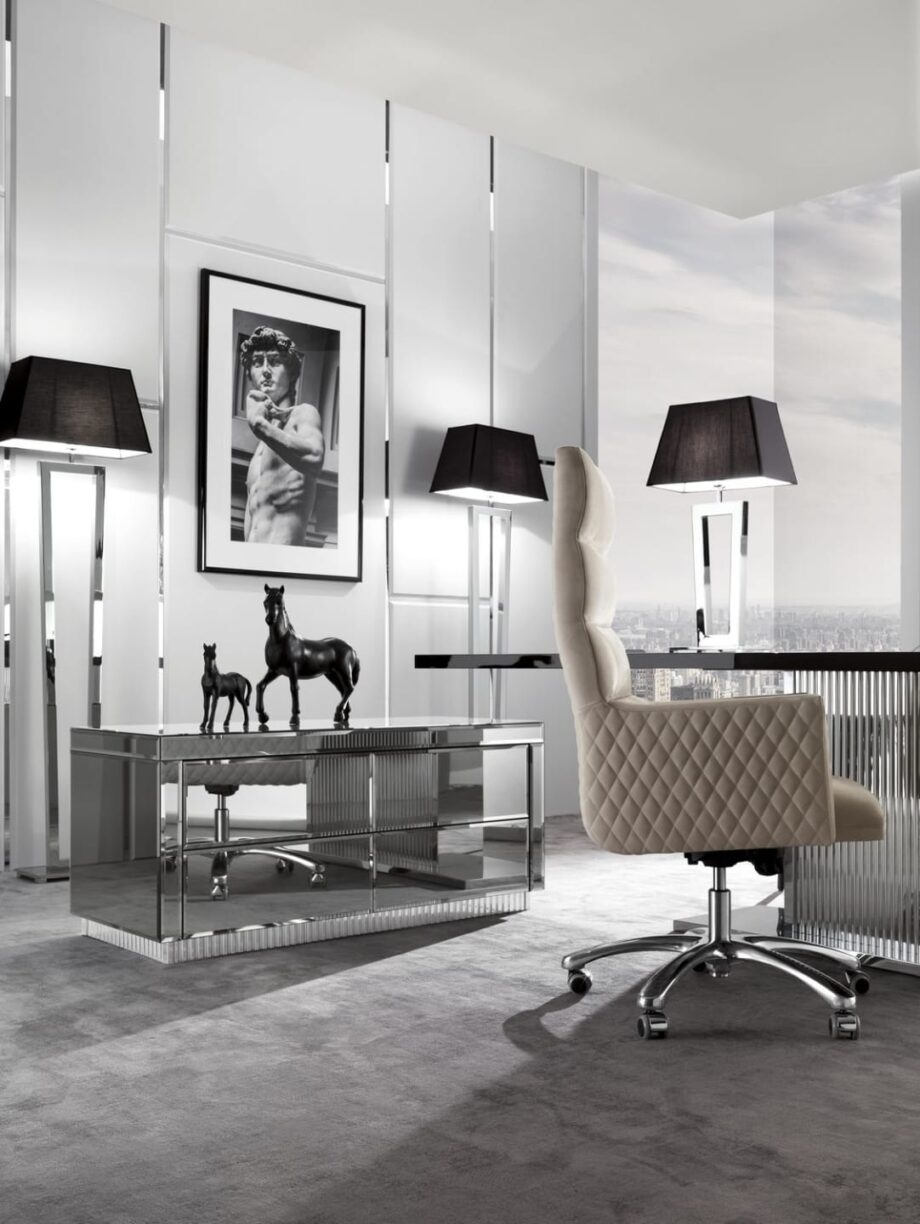 Windsor executive chair | DV home. Luxurious swivel armchair with Art Deco flair, offering supreme comfort and sophisticated design for discerning interiors.