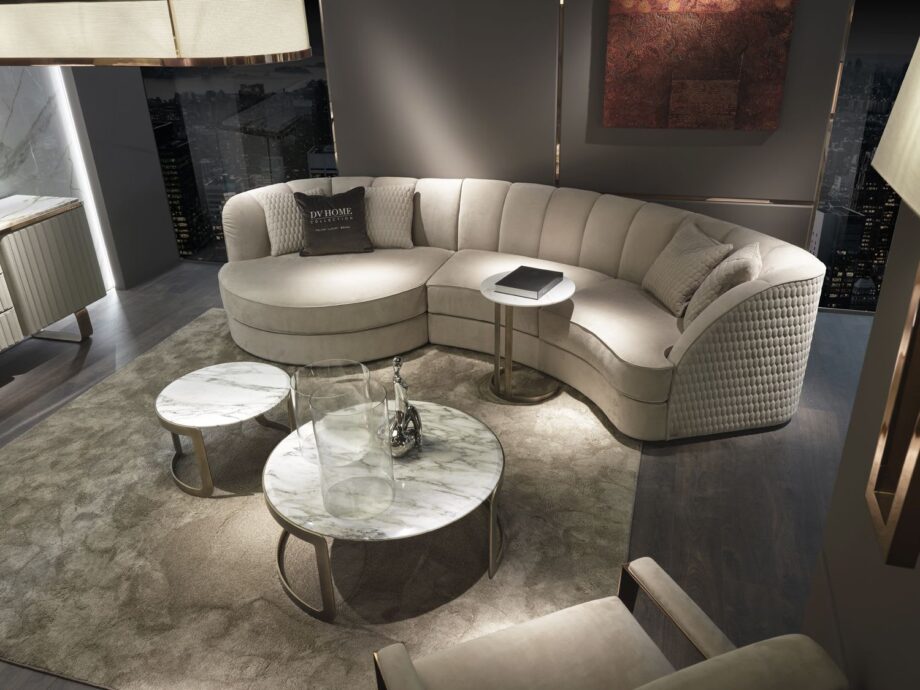 Hollywood coffee table | DV home. A luxurious Italian coffee table featuring a marble or wood top and an elegant metal base, embodying the Art Deco style.