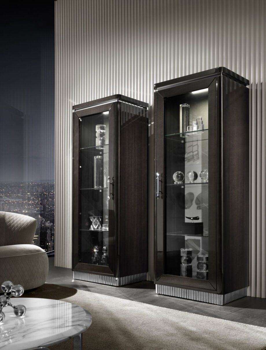 Egoist display cabinet | DV home. Elegant Art Deco display case with integrated lighting, glass shelves, wood, and metal finishes.