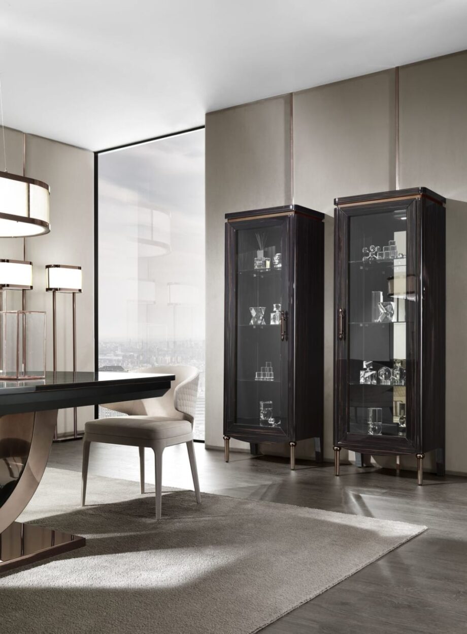Egoist display cabinet | DV home. Elegant Art Deco display case with integrated lighting, glass shelves, wood, and metal finishes.
