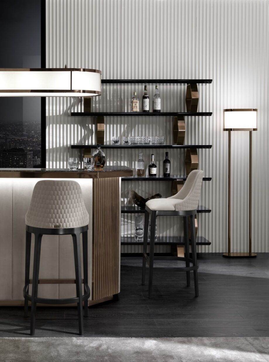Egoist bar chair | DV home. Exquisite bar stool featuring a solid wood frame and quilted upholstery, offering exceptional comfort and refined style.