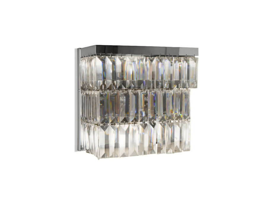 Byron wall lamp | DV home. An exquisite Art Deco wall lamp featuring a polished chrome brass structure adorned with dazzling bevelled crystal pendants.