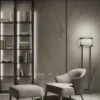 Gordon floor lamp | DV home. Elegant floor lamp with a metal structure and fabric shade, embodying luxurious Art Deco design.