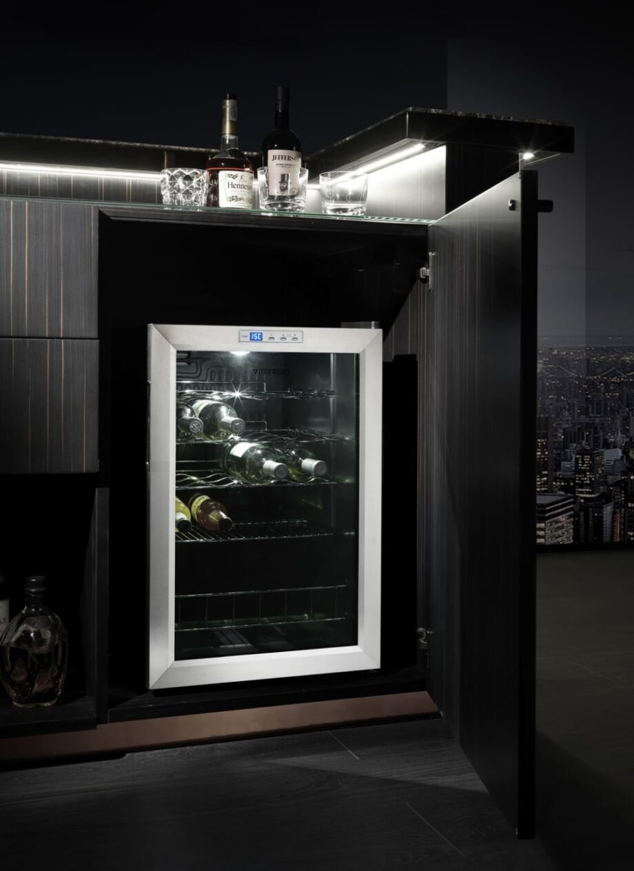 Charlotte bar cabinet | DV home. Elegant bar cabinet crafted from Macassar ebony, marble, and leather with integrated lighting and wine cellar.