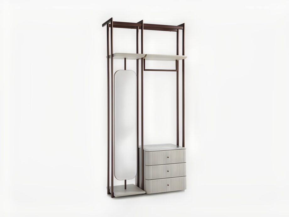 Hollywood closet | DV home. A luxurious walk-in closet featuring an antique bronze stainless steel structure, leather-covered drawers, a Calacatta marble top, and an integrated mirror.