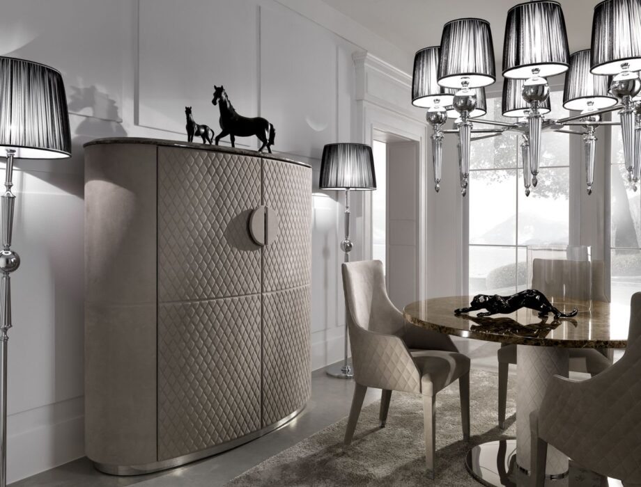 Douglas chandelier | DV home. A luxurious Art Deco chandelier crafted from shining brass or chrome, adorned with elegant fabric shades and dazzling crystal accents.