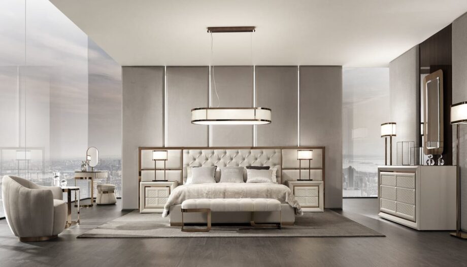 Chelsea Maxi bed | DV home. Exquisite bed with a high tufted headboard and metallic accents, embodying luxury and comfort.