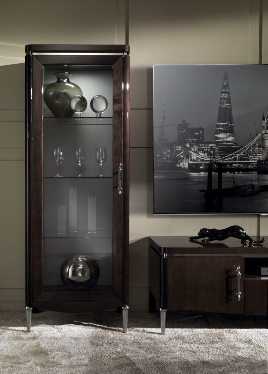Egoist display cabinet | DV home. Elegant Art Deco display case with integrated lighting, glass shelves, wood, and metal finishes.