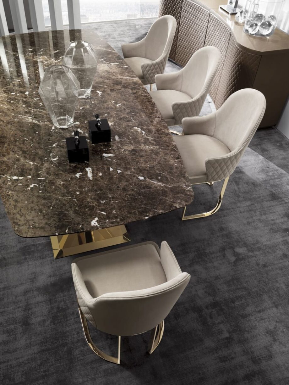 Ritz table | DV home. Exquisite Art Deco dining table with geometric metal base and luxurious marble or wood top.