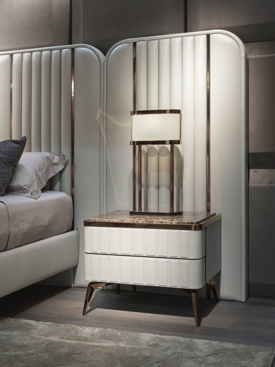 Hollywood Maxi bed | DV home. An opulent Italian luxury bed featuring a striking high upholstered headboard with elegant vertical inserts, perfect for sophisticated bedrooms.