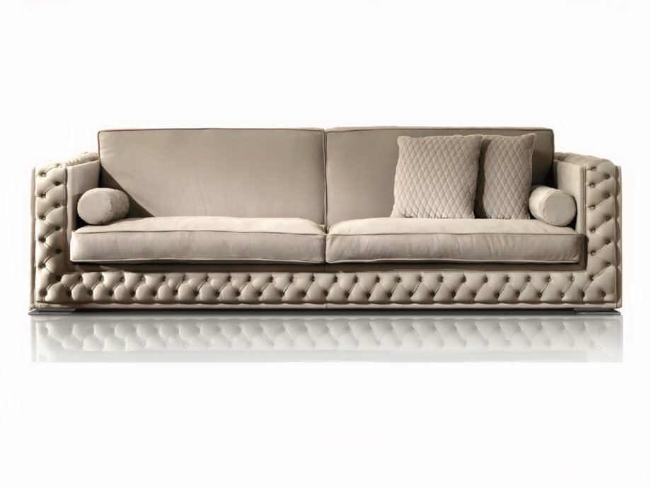 Velvet sofa | DV home. Luxurious Art Deco sofa with tufted upholstery, solid wood frame, goose feather cushions, and chrome feet.