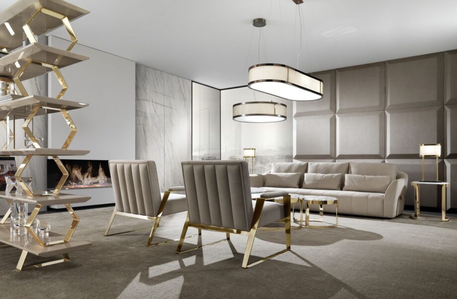 Ritz sofa | DV home. Luxurious custom upholstered sofa with elegant steel frame and plush goose feather cushions, epitomizing Art Deco sophistication.