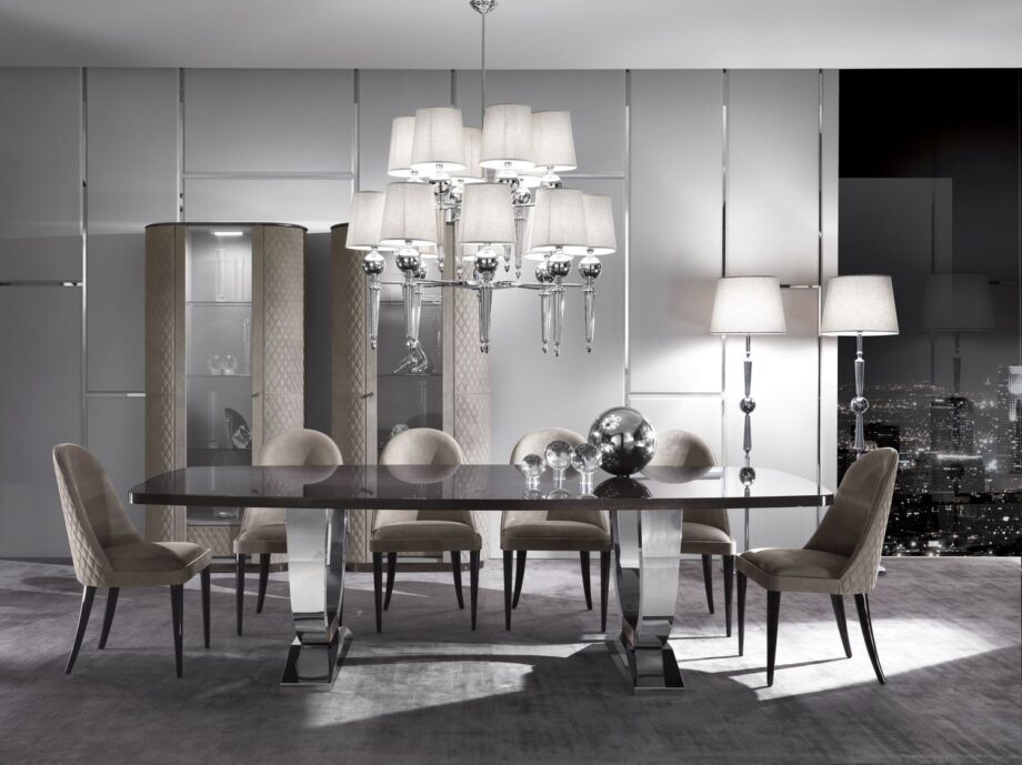 Douglas Plus chandelier | DV home. A luxurious Art Deco chandelier with a gleaming brass or chrome structure and elegant fabric shades, perfect for sophisticated interiors.