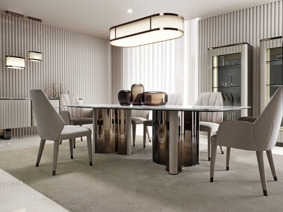 Elite chair | DV home. Luxurious Italian armchair with elegant curves, premium upholstery, and polished steel details, perfect for sophisticated interiors.